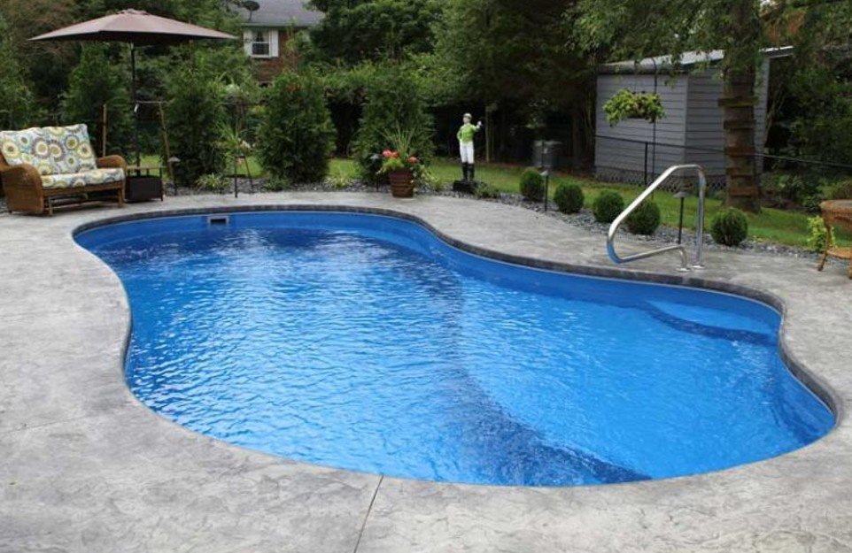 a unique shaped fiberglass pool