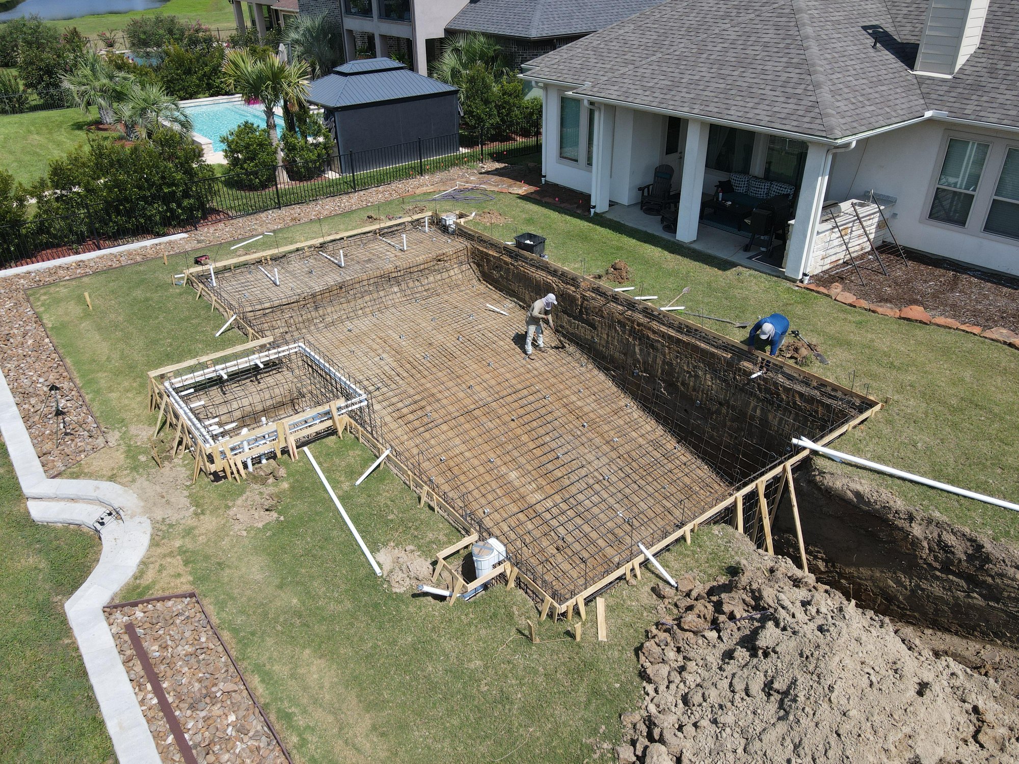an exacavation in preparation for fiberglass pool installation